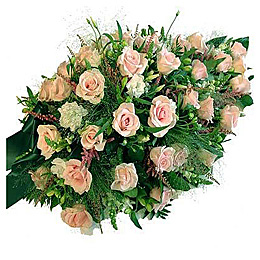 Klassiek roze bloemen rouwarrangement