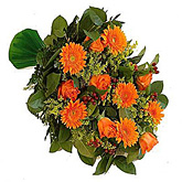 Rouwboeket met oranje en gele bloemen